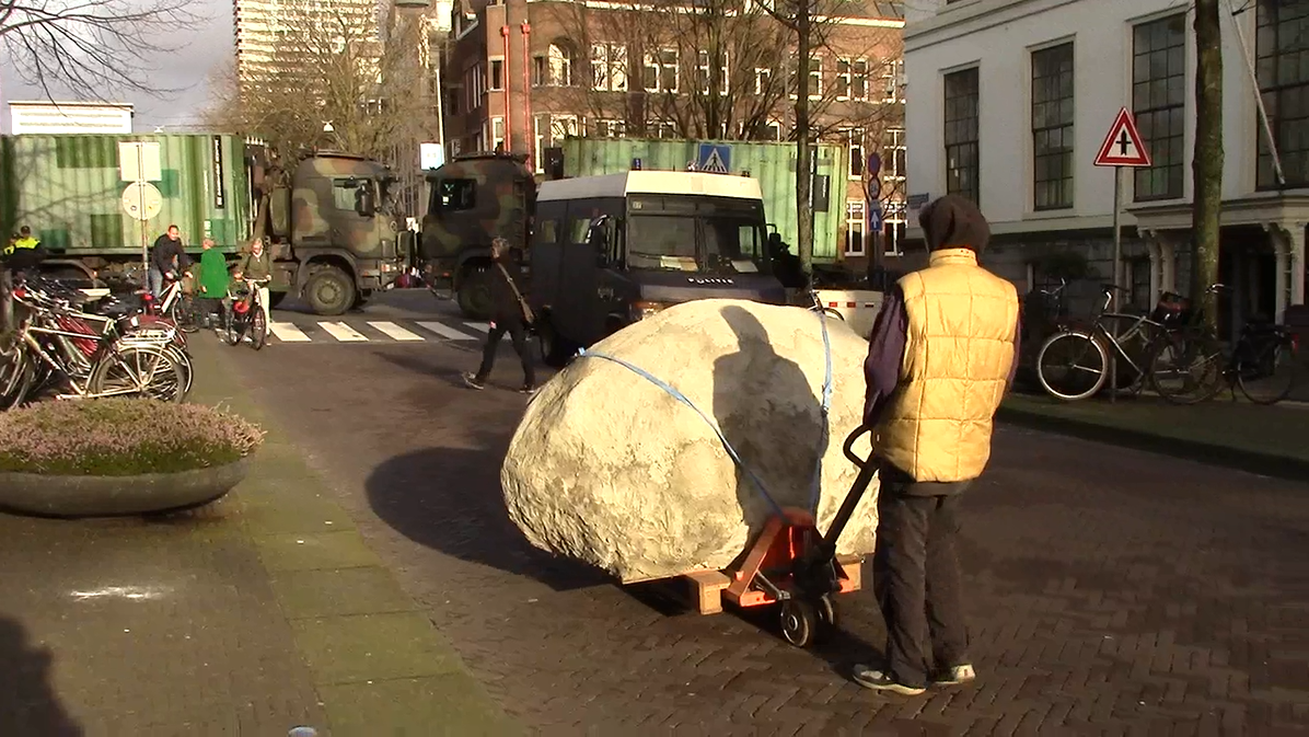 screenshot of video documentation of the tranportation of the rock